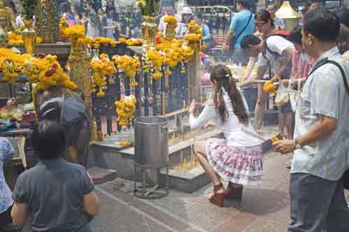 pray at erawan-AsiaPhotoStock