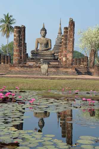 reflected buddha-AsiaPhotoStock