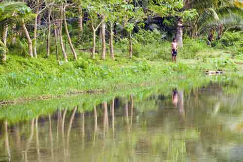 reflection of fisherman-AsiaPhotoStock