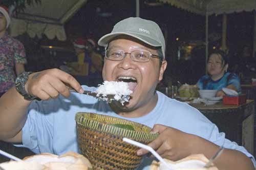 mouthful of rice-AsiaPhotoStock