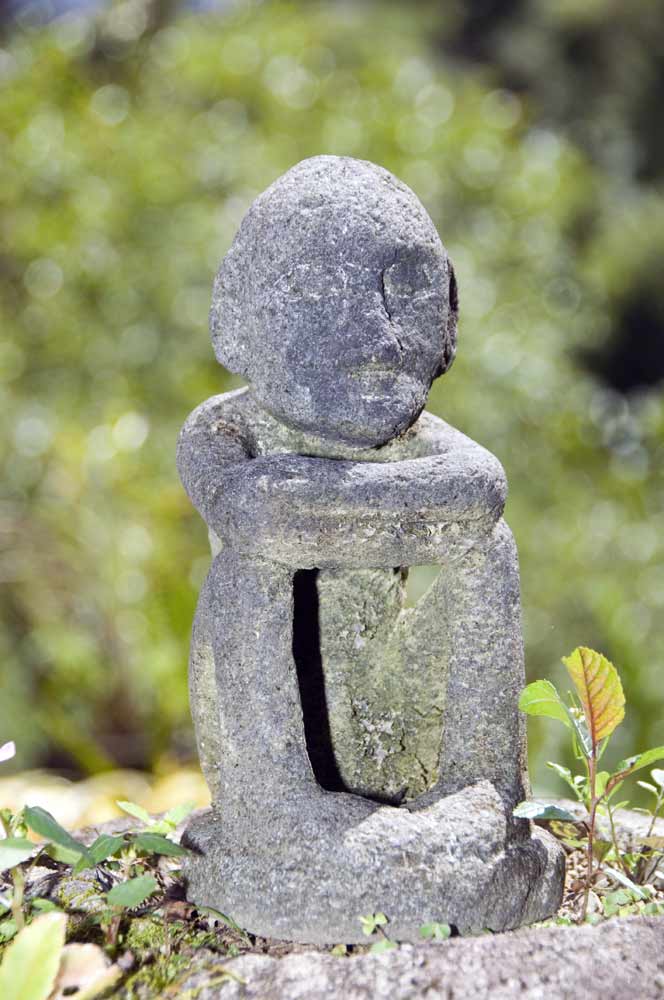 stone rice god-AsiaPhotoStock