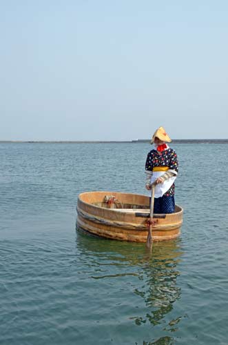 rower of tub boat-AsiaPhotoStock