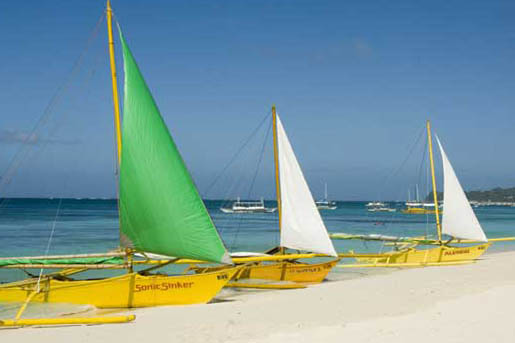 sails at white beach-AsiaPhotoStock