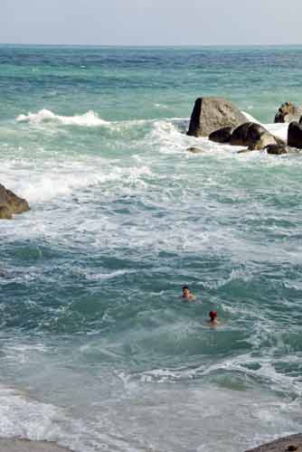 swimming choppy sea-AsiaPhotoStock