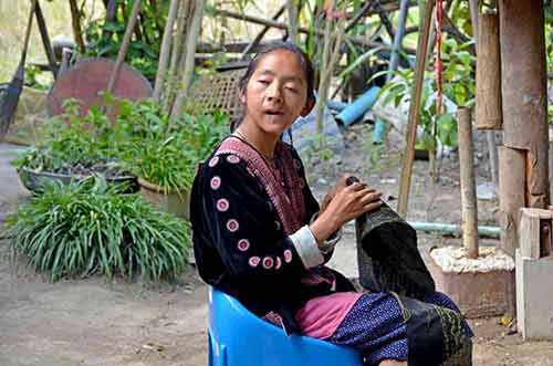 sewing hmong-AsiaPhotoStock