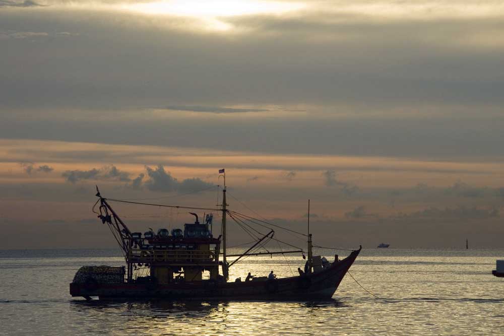 fishing boat silhouette-AsiaPhotoStock