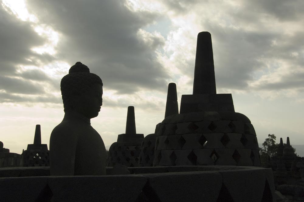 silhouetted buddha-AsiaPhotoStock