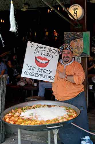 smile paella being served-AsiaPhotoStock