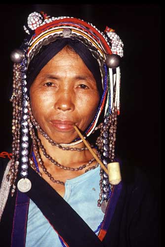 akha smoking a clay pipe-AsiaPhotoStock