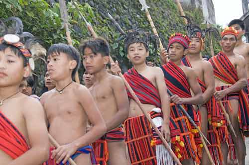 boys with spears-AsiaPhotoStock