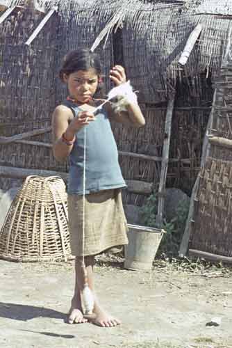 girl spinning wool-AsiaPhotoStock