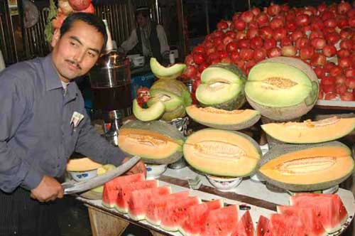 cutting water melons-AsiaPhotoStock