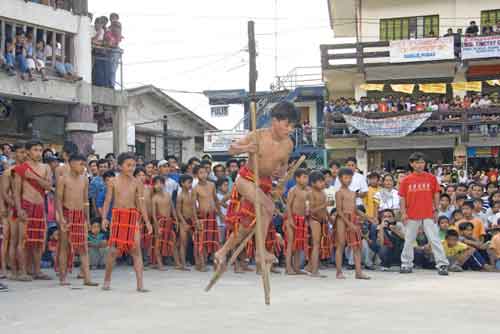 stilt race in plaza-AsiaPhotoStock