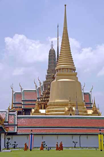 monks at stupas-AsiaPhotoStock