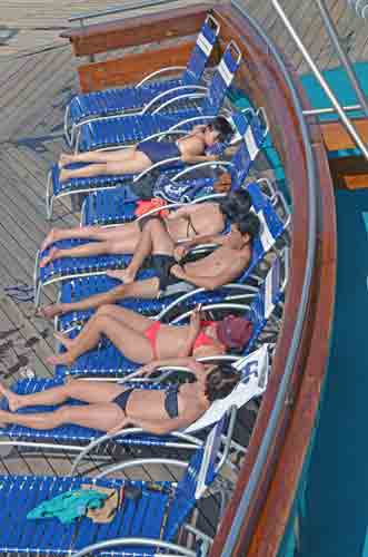 sunbathers on deck-AsiaPhotoStock