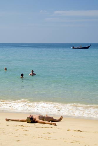 beach sunbathing-AsiaPhotoStock