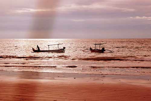 jukung in kuta sunset-AsiaPhotoStock