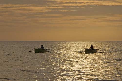 boats at dusk fernando-AsiaPhotoStock