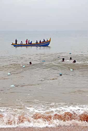 swimming fishermen-AsiaPhotoStock