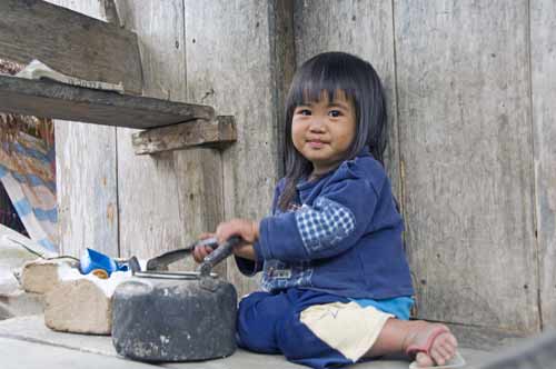 girl and kettle-AsiaPhotoStock