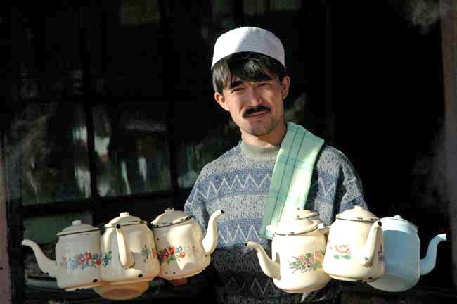 handfull of teapots-AsiaPhotoStock