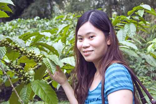 posing with coffee-AsiaPhotoStock