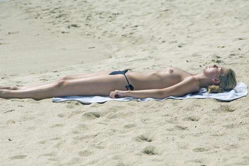 topless sunbather-AsiaPhotoStock