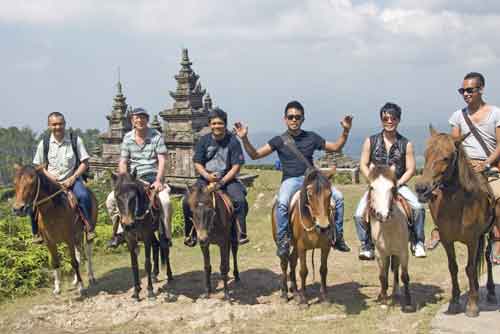 tourists gedung songo-AsiaPhotoStock