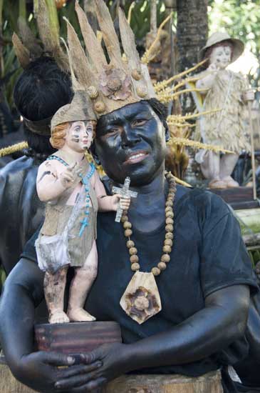 tribesman and santo nino-AsiaPhotoStock