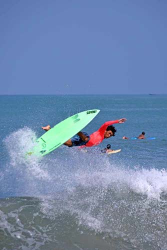 tumble in surf bali-AsiaPhotoStock