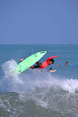 tumble in surf bali-AsiaPhotoStock