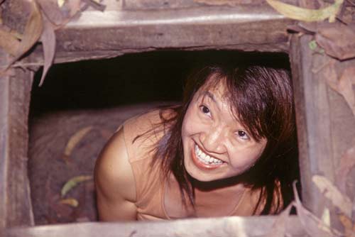 tourist in cu chi tunnel-AsiaPhotoStock