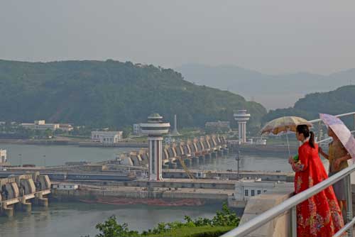 umbrellas at dam-AsiaPhotoStock