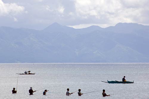 waders fishing with rods-AsiaPhotoStock