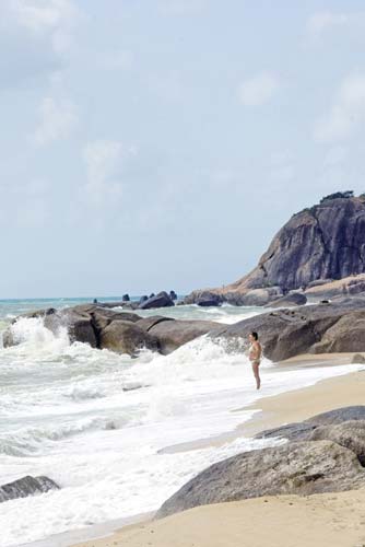 woman on beach-AsiaPhotoStock