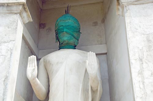 blindfold buddha-AsiaPhotoStock