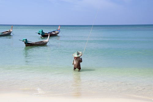 nai yang fishing lady-AsiaPhotoStock