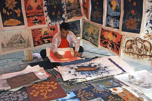 artist painting in laos-AsiaPhotoStock