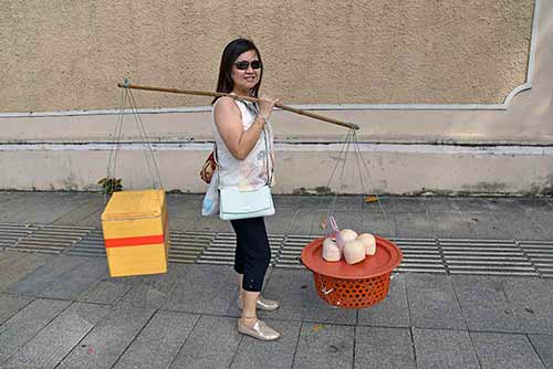pole carrying-AsiaPhotoStock