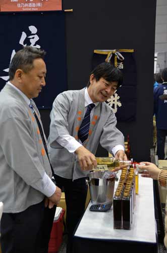 pouring sake-AsiaPhotoStock