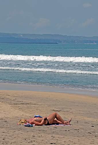 sunbathe in bali-AsiaPhotoStock