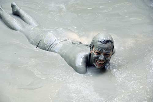swimming in mud spa-AsiaPhotoStock