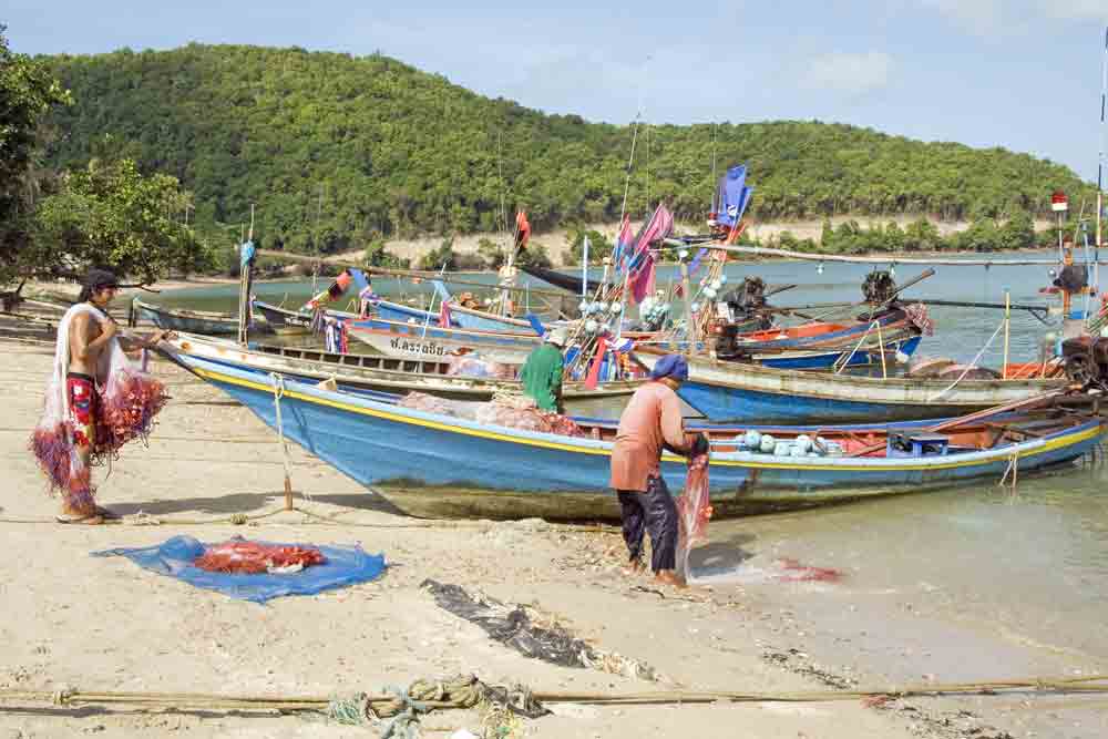 wash fishing nets-AsiaPhotoStock